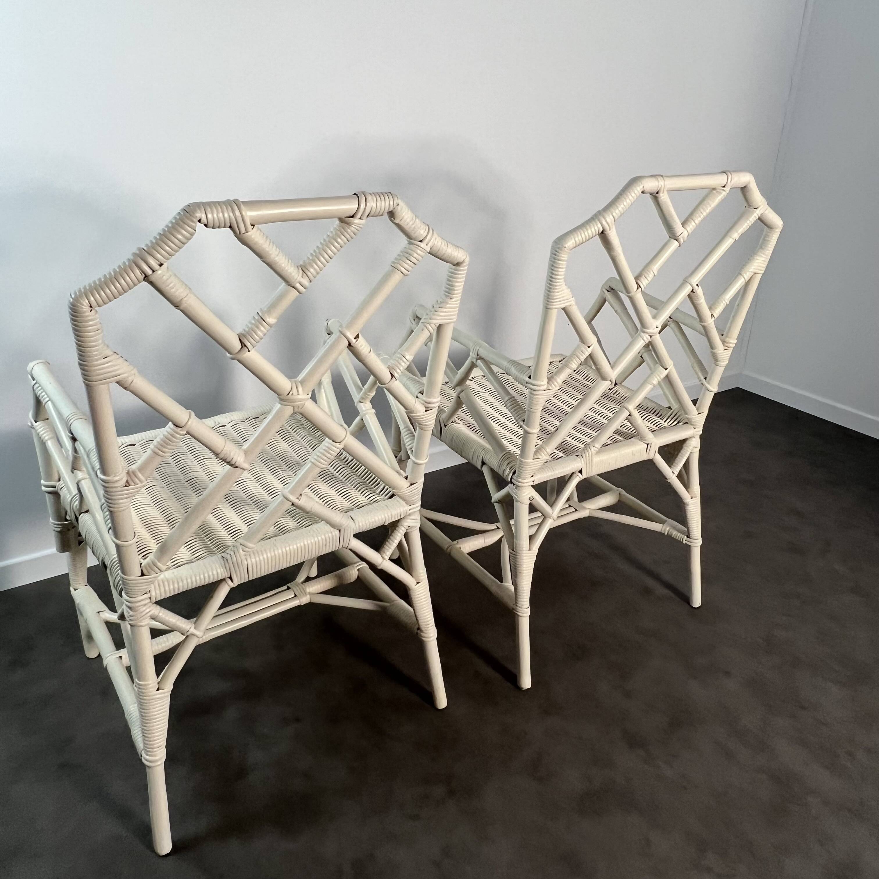 Pair of Angraves armchairs model Invincible in Chinese Chippendale style.