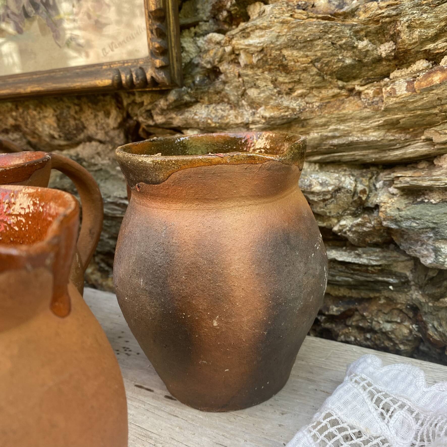 set of terracotta jugs country style