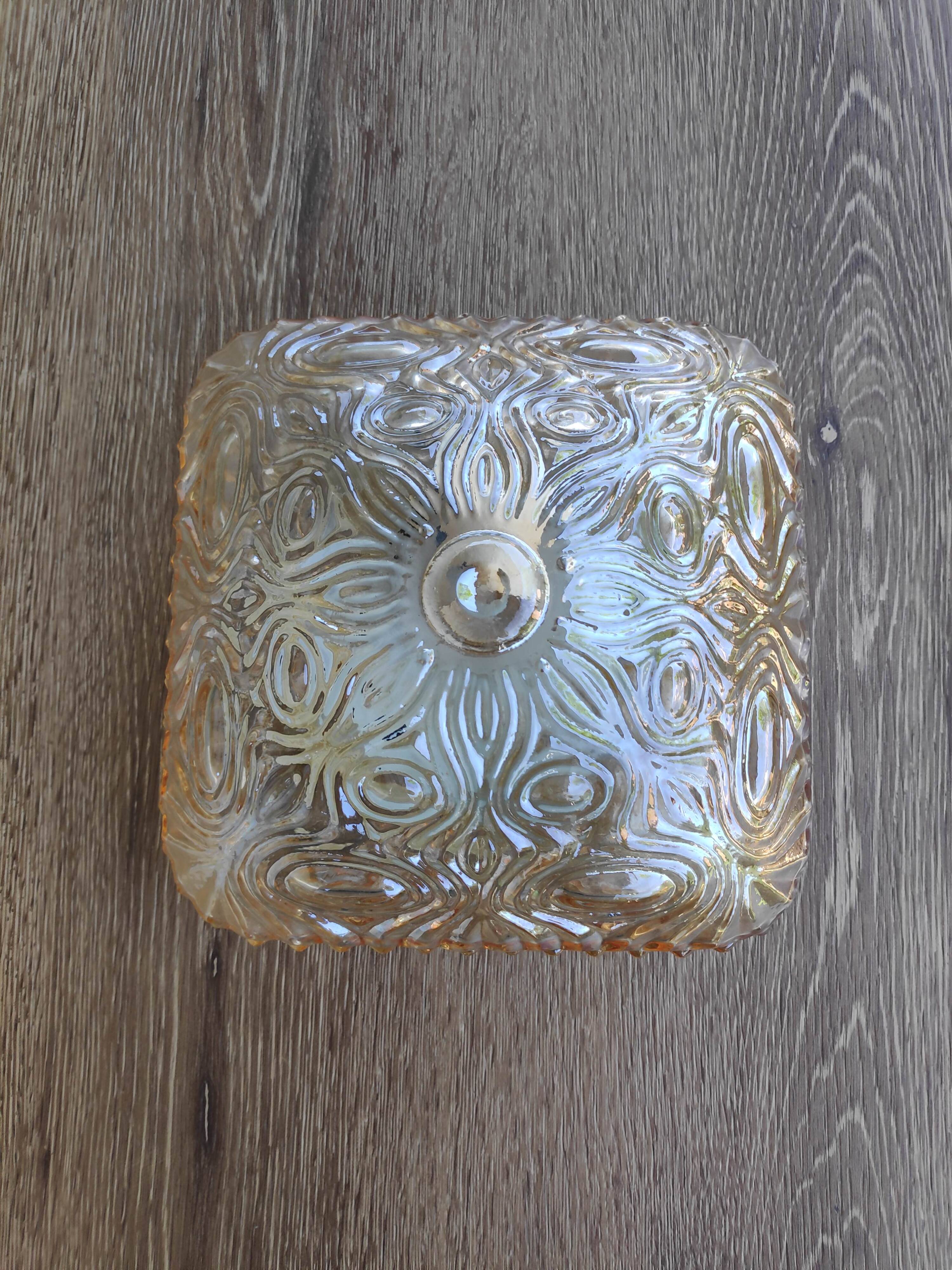 Amber ceiling light in thick glass