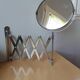 Telescopic accordion mirror