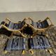 2 wooden footrests with blue cushions