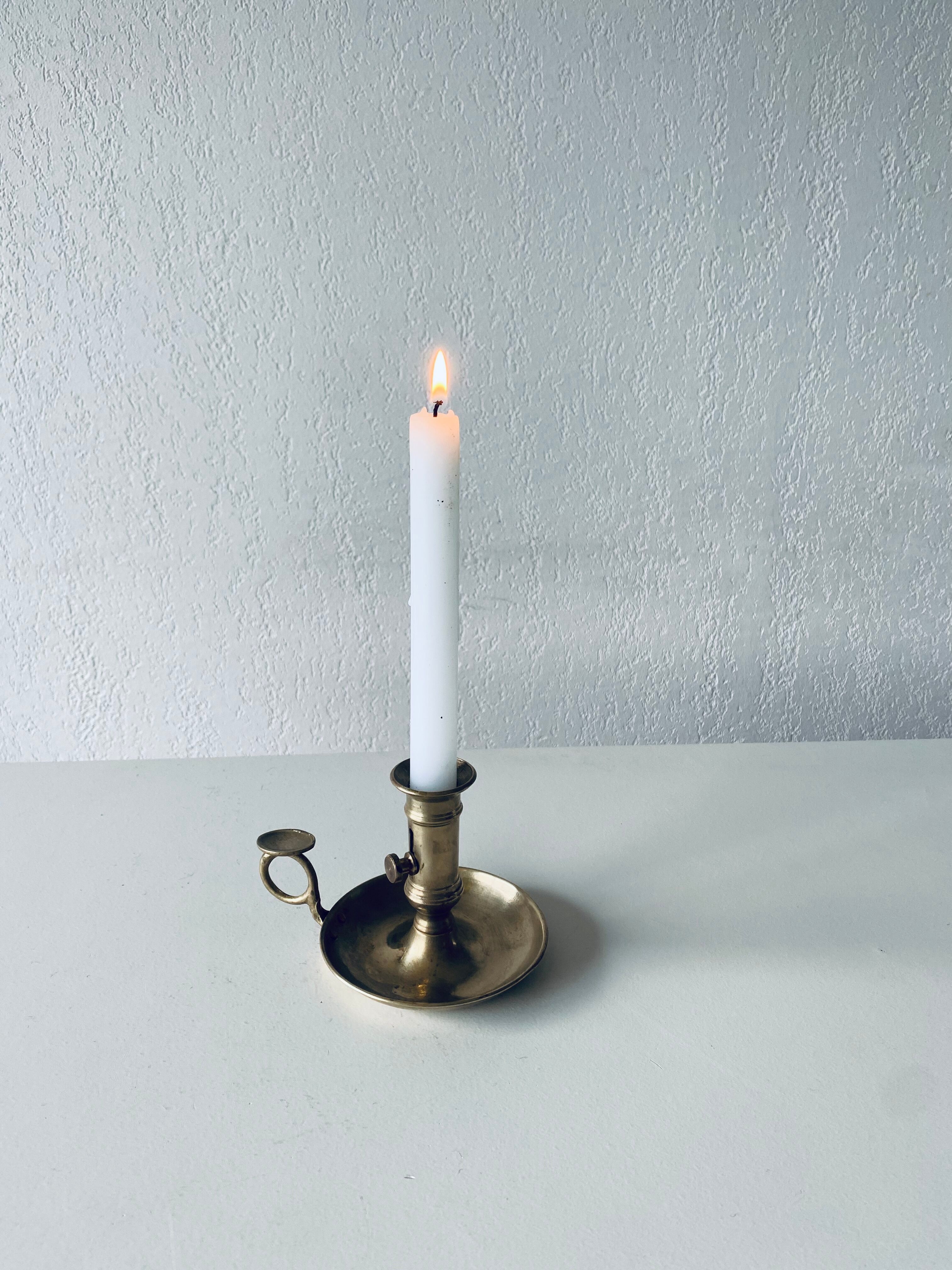 Antique brass candle holder