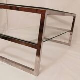 1980s coffee table with a double chrome metal top.