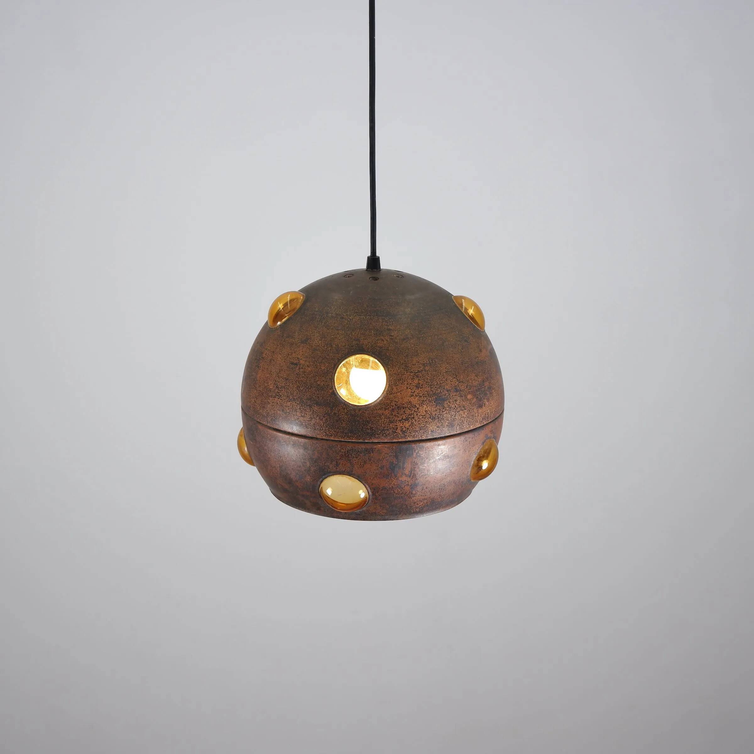 Large, globular brutalist hanging lamp in copper / glass by Peill & Putzler