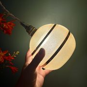 Suspension globe vintage en verre granité jaune et doré