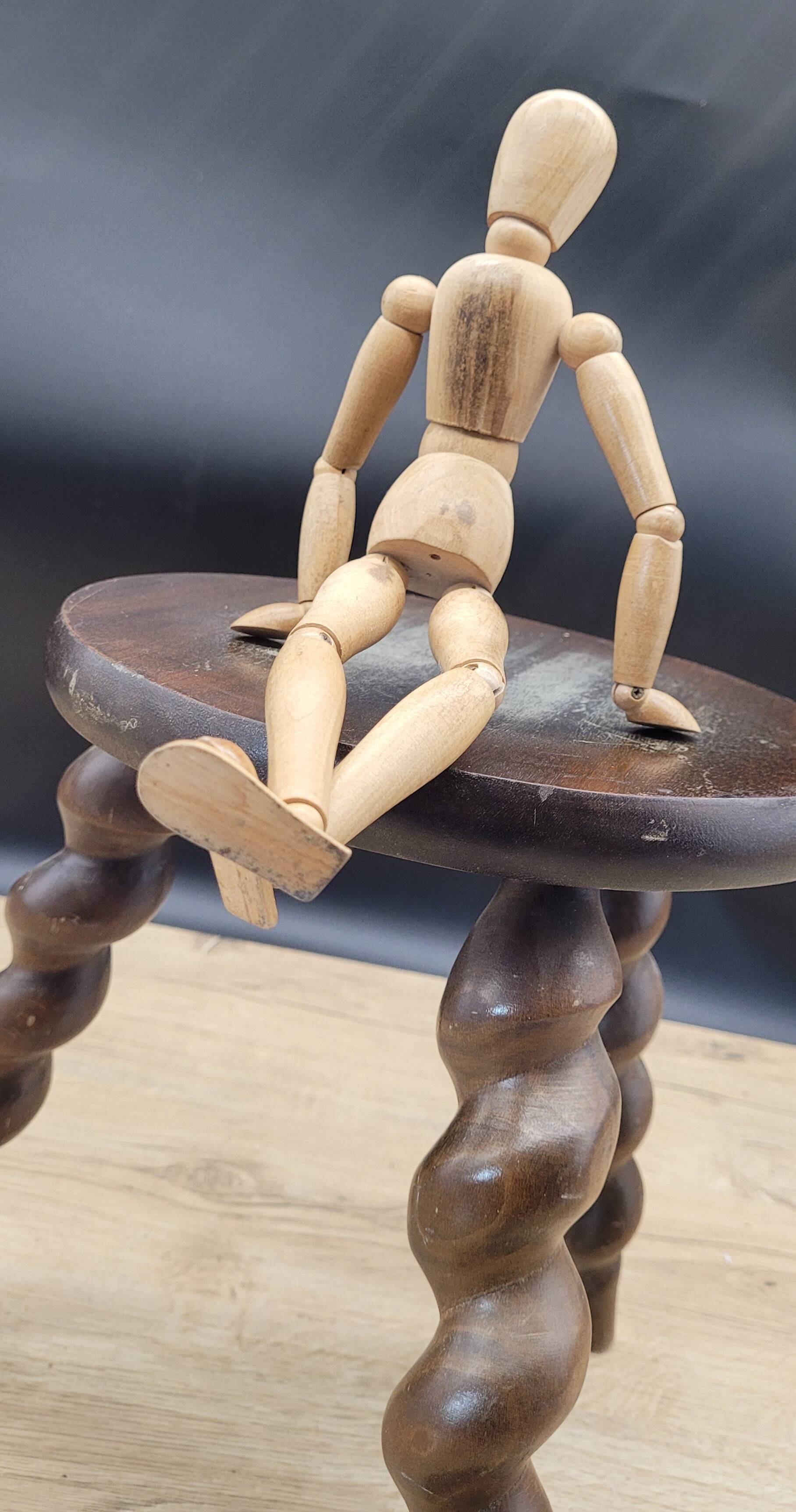 Tripod stool with turned legs