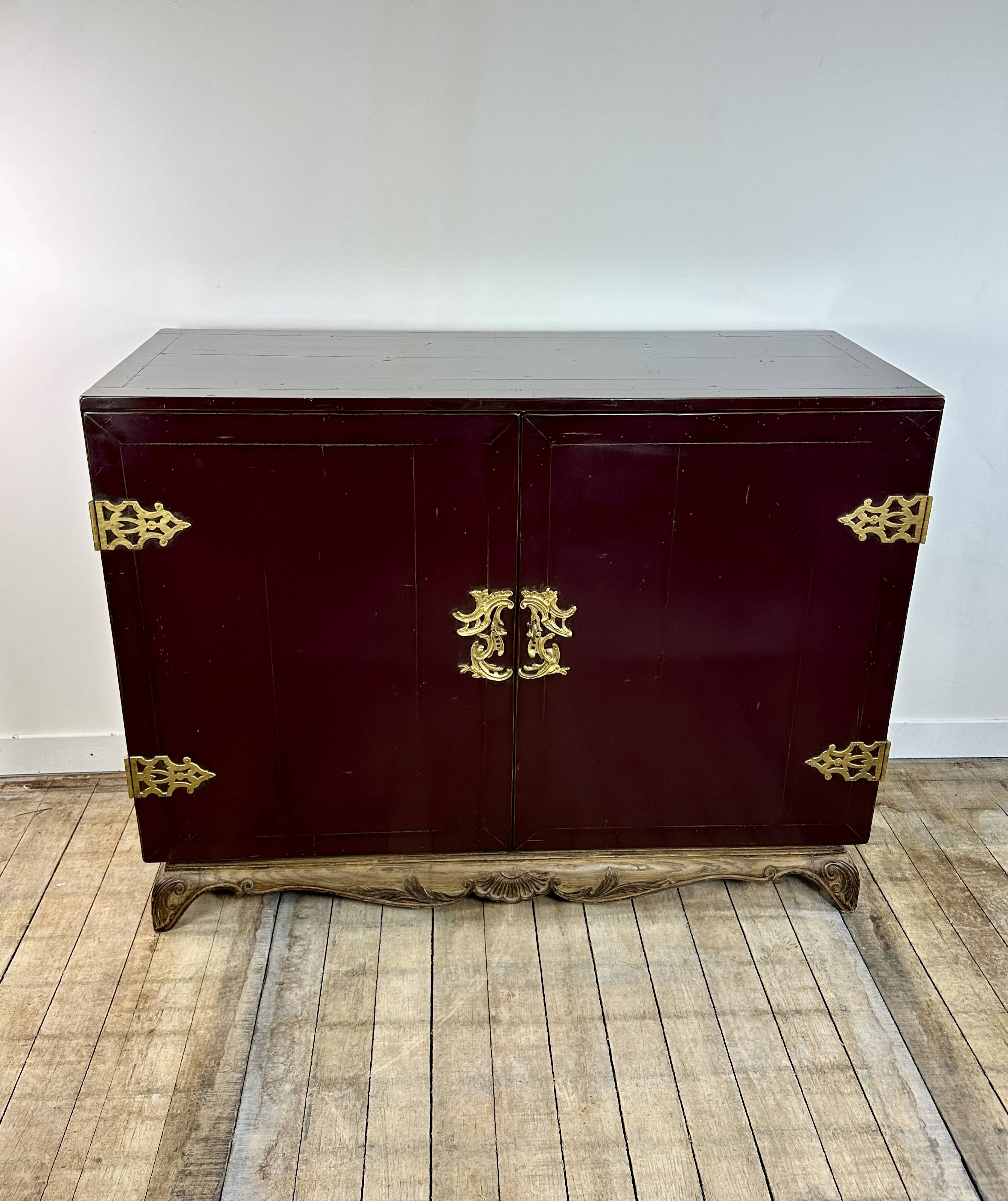 1950's lacquered wood and brass sideboard