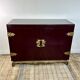 1950's lacquered wood and brass sideboard