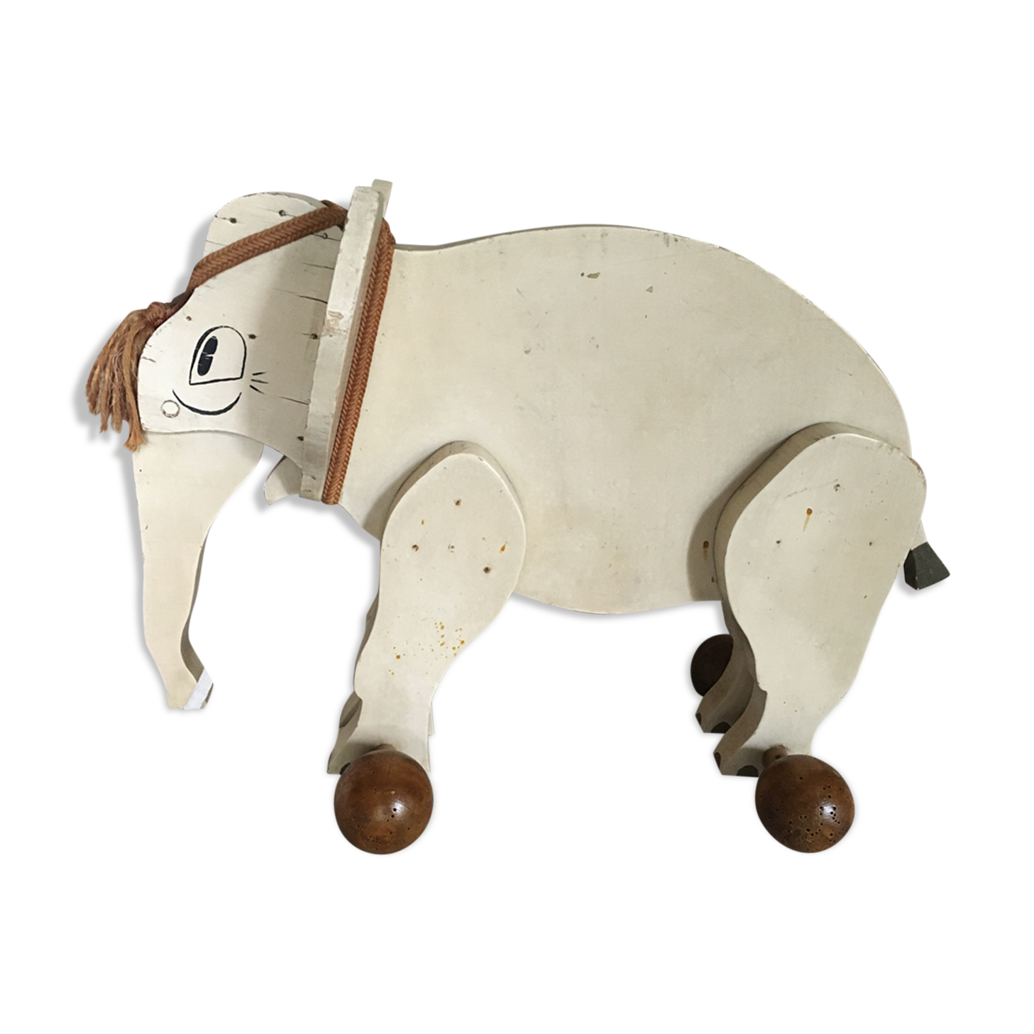 Wooden elephant on wheels