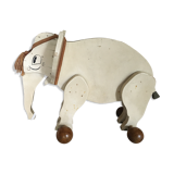 Wooden elephant on wheels