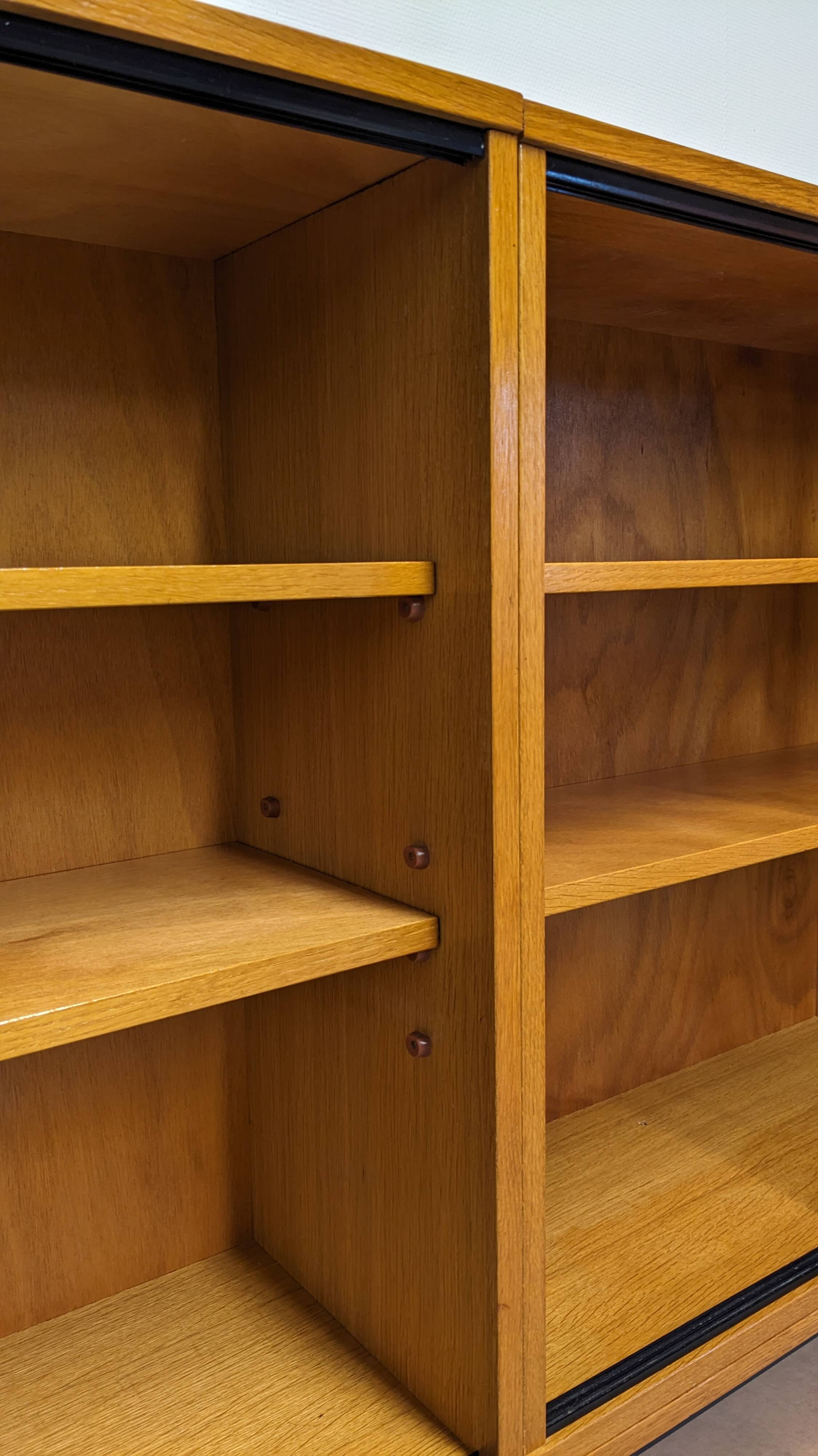 Library or display cabinet with 4 modules in light oak, France around 1960.