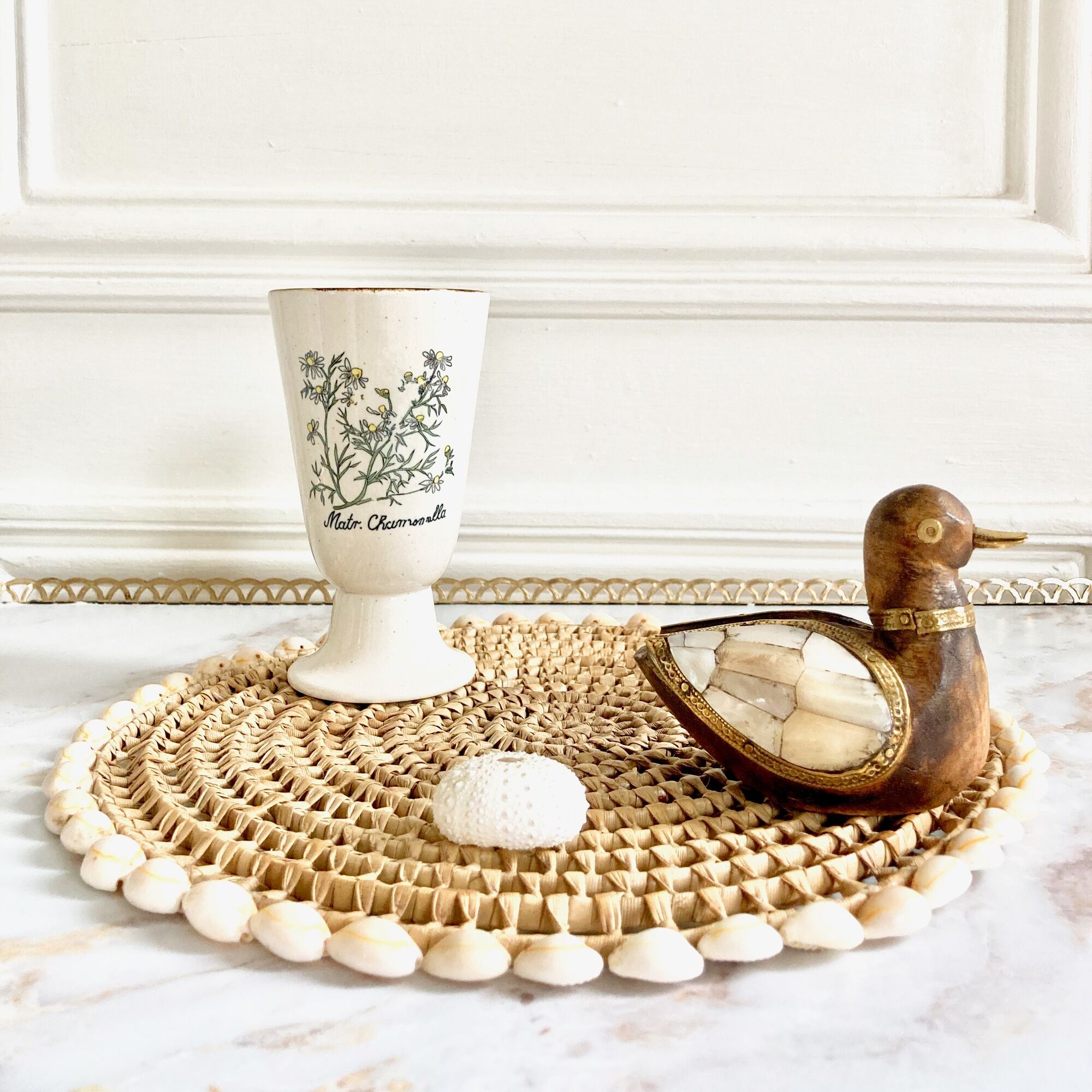 Wood brass duck and mother-of-pearl