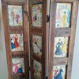 Wooden screen with vintage haute couture images or for photos