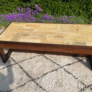 Vintage coffee table in rosewood and ceramic.