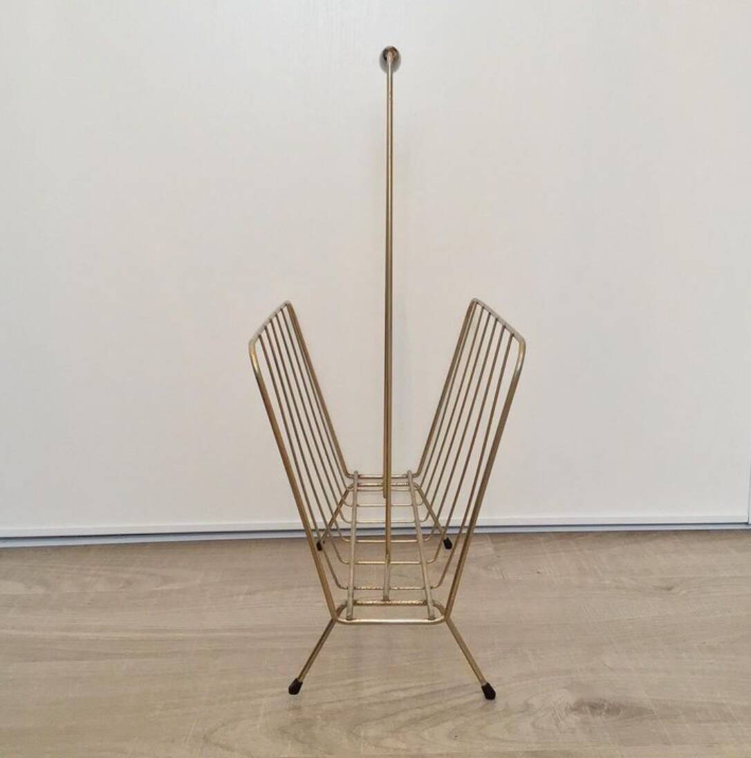 Vintage magazine rack in gold metal