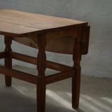 Modern Danish folding side table in solid oak, mid-20th century.