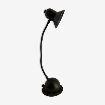 Articulated and adjustable black metal lamp