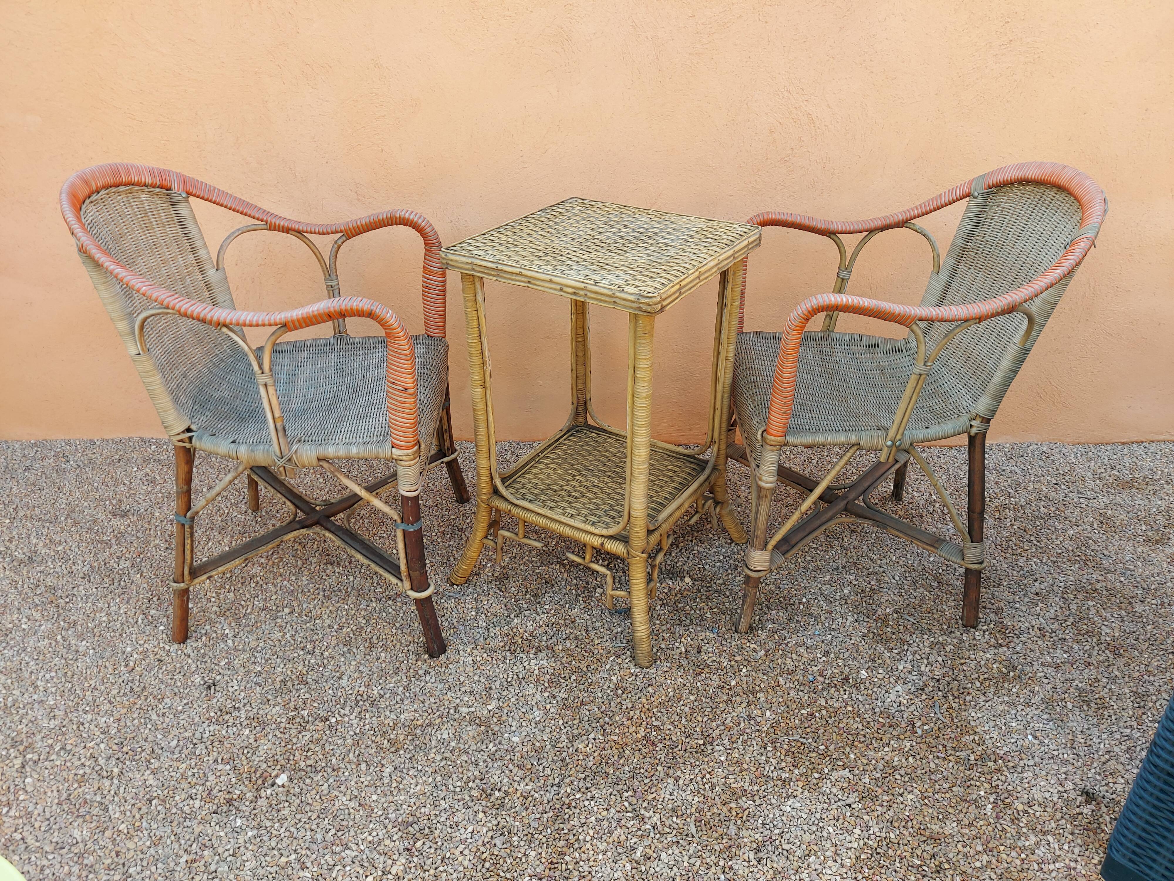 Pair of armchairs and rattan gueridon 1900s
