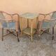 Pair of armchairs and rattan gueridon 1900s
