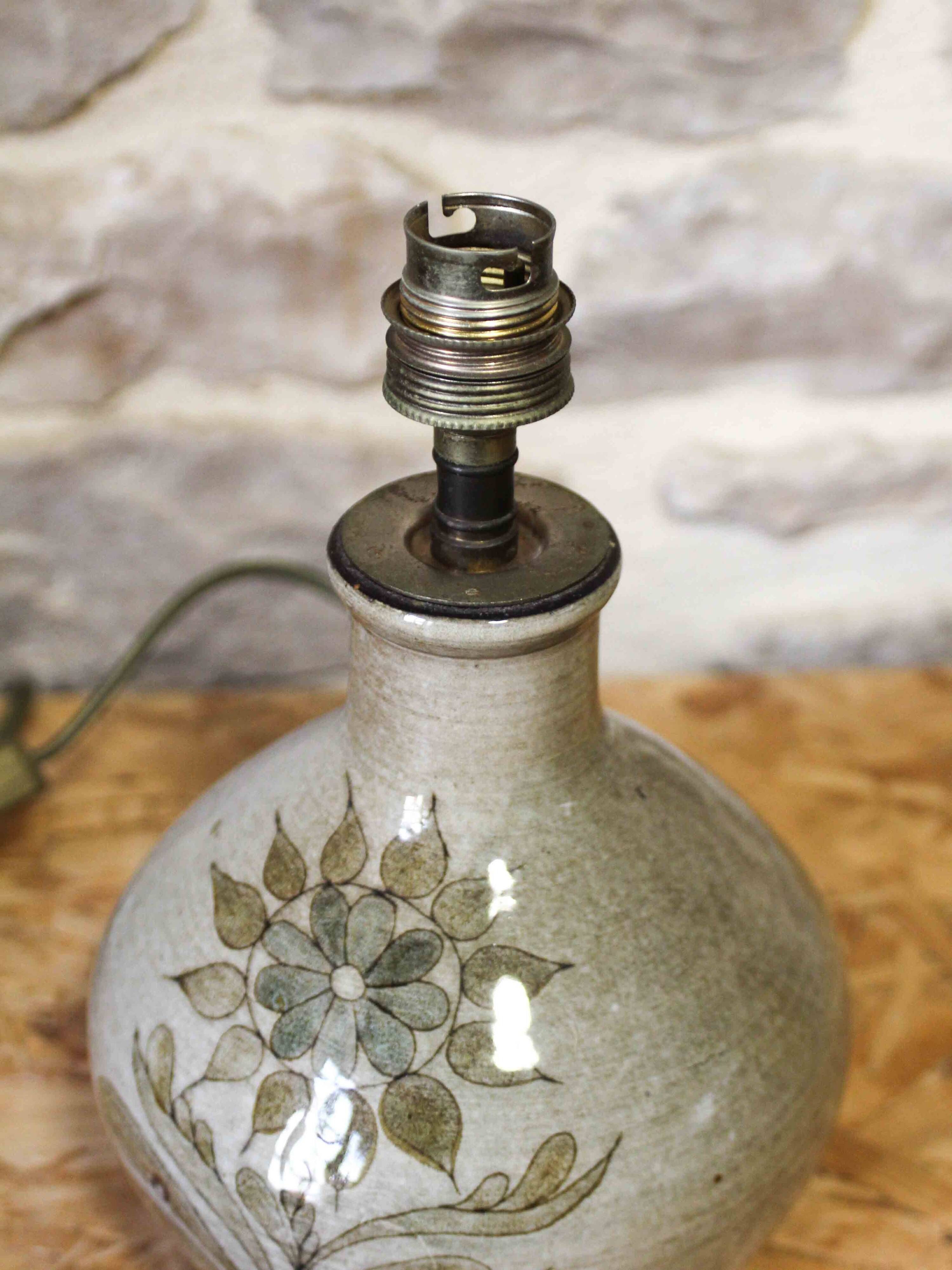 Ceramic lamp base with flower decoration