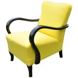 Art Deco armchair in yellow and black, made of painted wood and cotton, high back, 1920s.