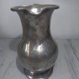 Old tin pitcher