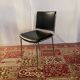 Vintage chair in black faux leather and chrome metal