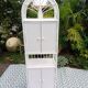 White rattan shelf
