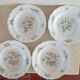 4 plates decorated with Lunéville roses
