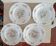 4 assiettes à décor de roses Lunéville