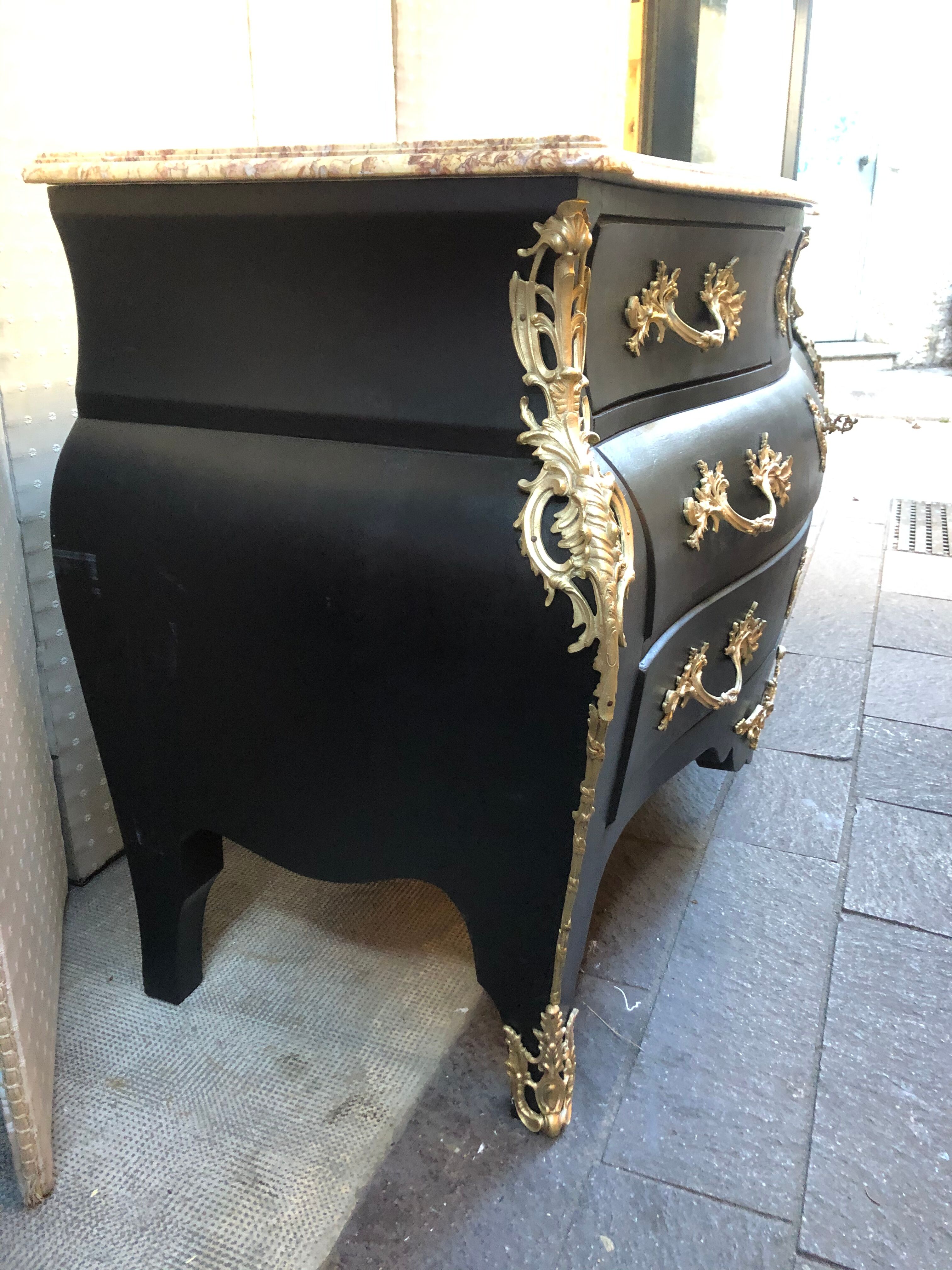 Chest of drawers "tomb" patinated black regency style