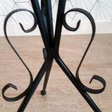 Plant holder in black wrought iron.