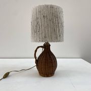 Rattan lamp and its mottled white wool lampshade