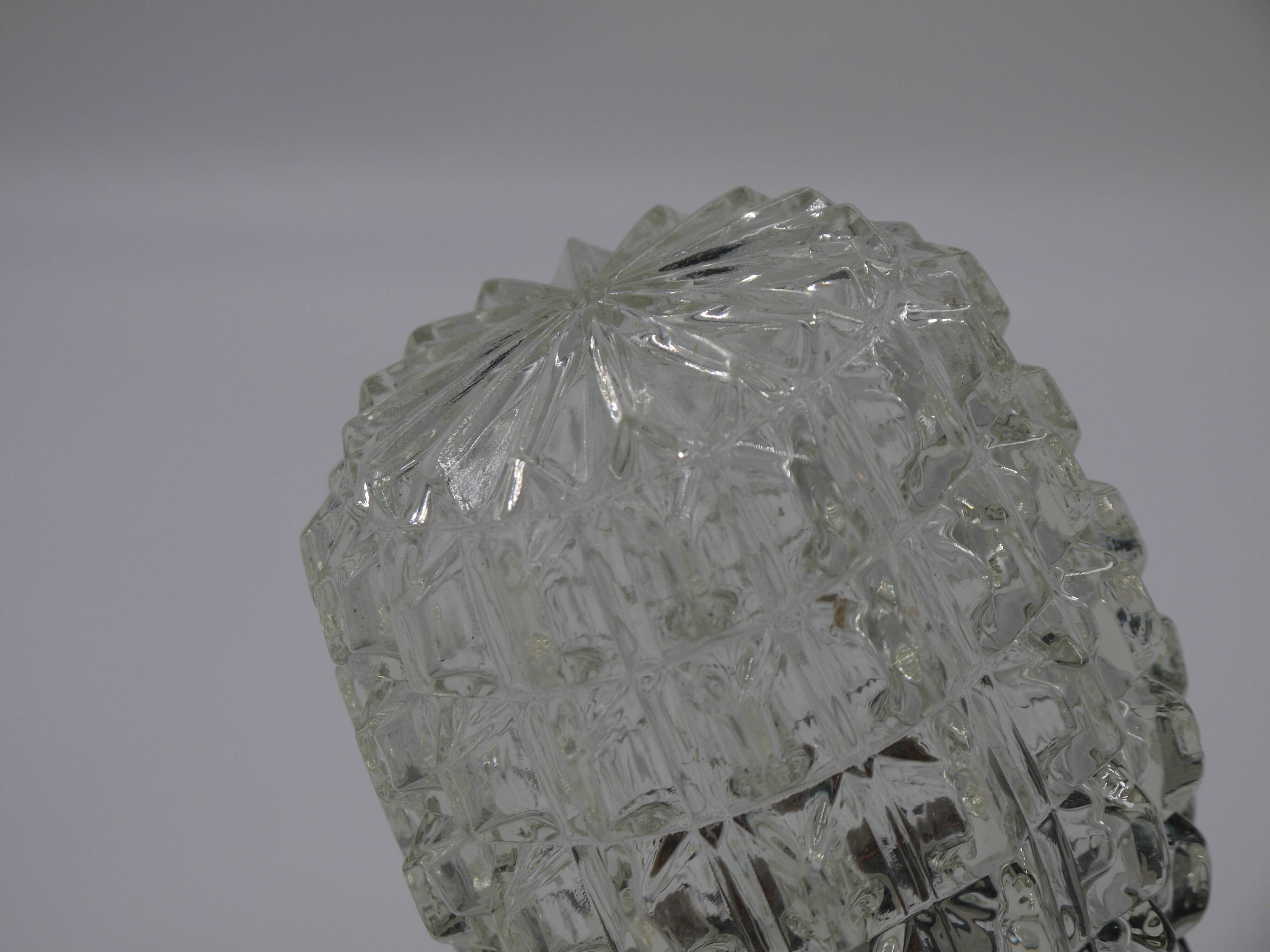 Oblique ceiling lamp in molded glass
