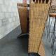 Vintage rattan and metal bar and its stools.