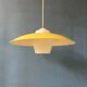 Danish mid-century suspension with opaline glass shade and yellow metal cover.