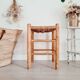 Old stool in wood and straw brutalist look