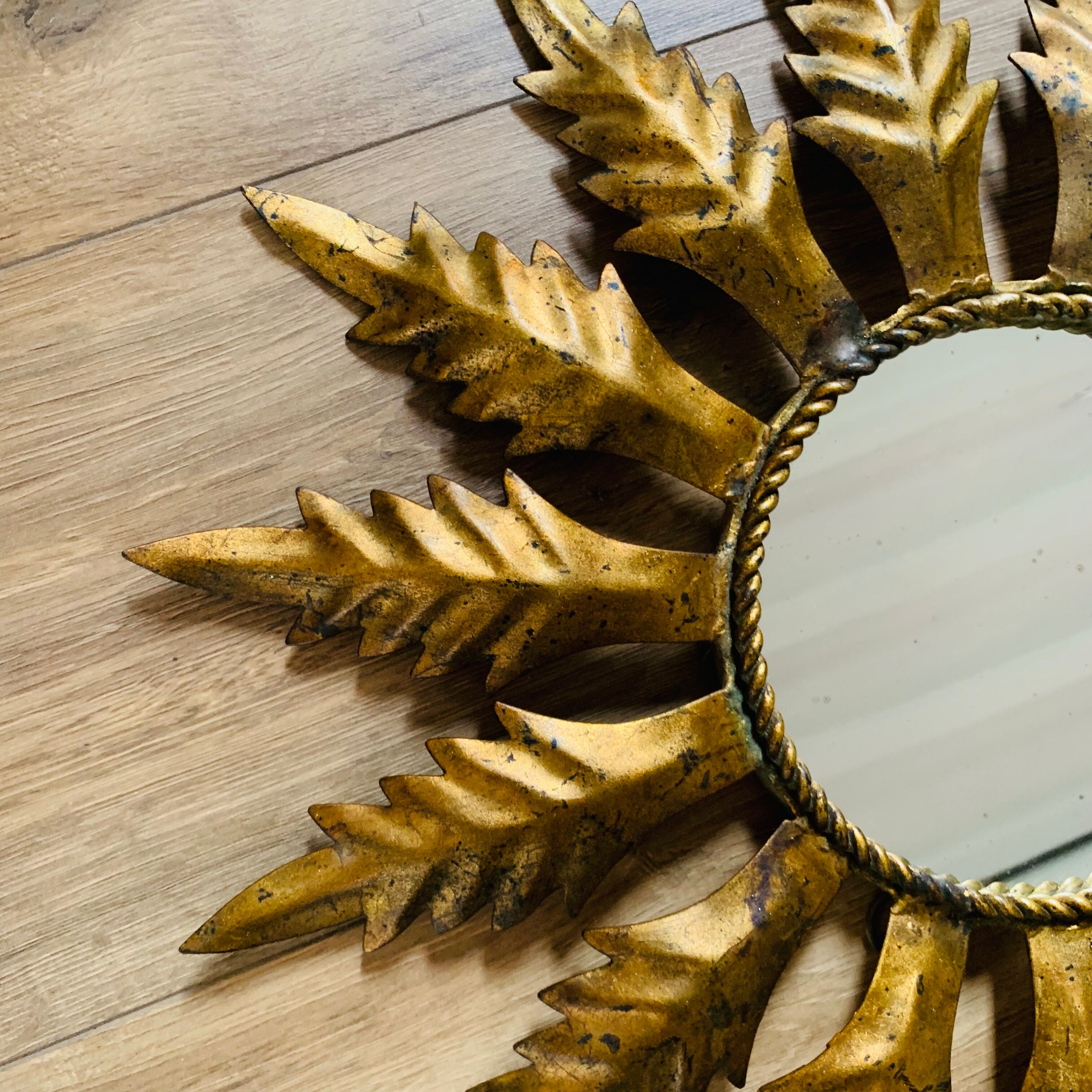 Golden metal sun mirror