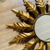 Miroir soleil métal doré