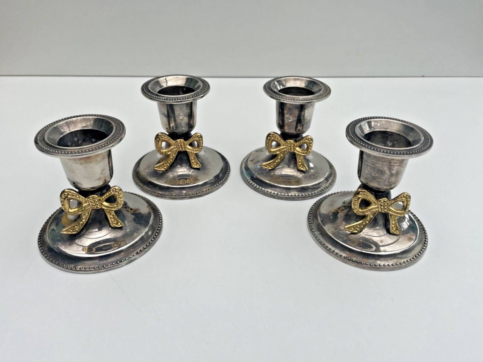 Set of 4 silver metal candle holders with gold bow - classic chic style