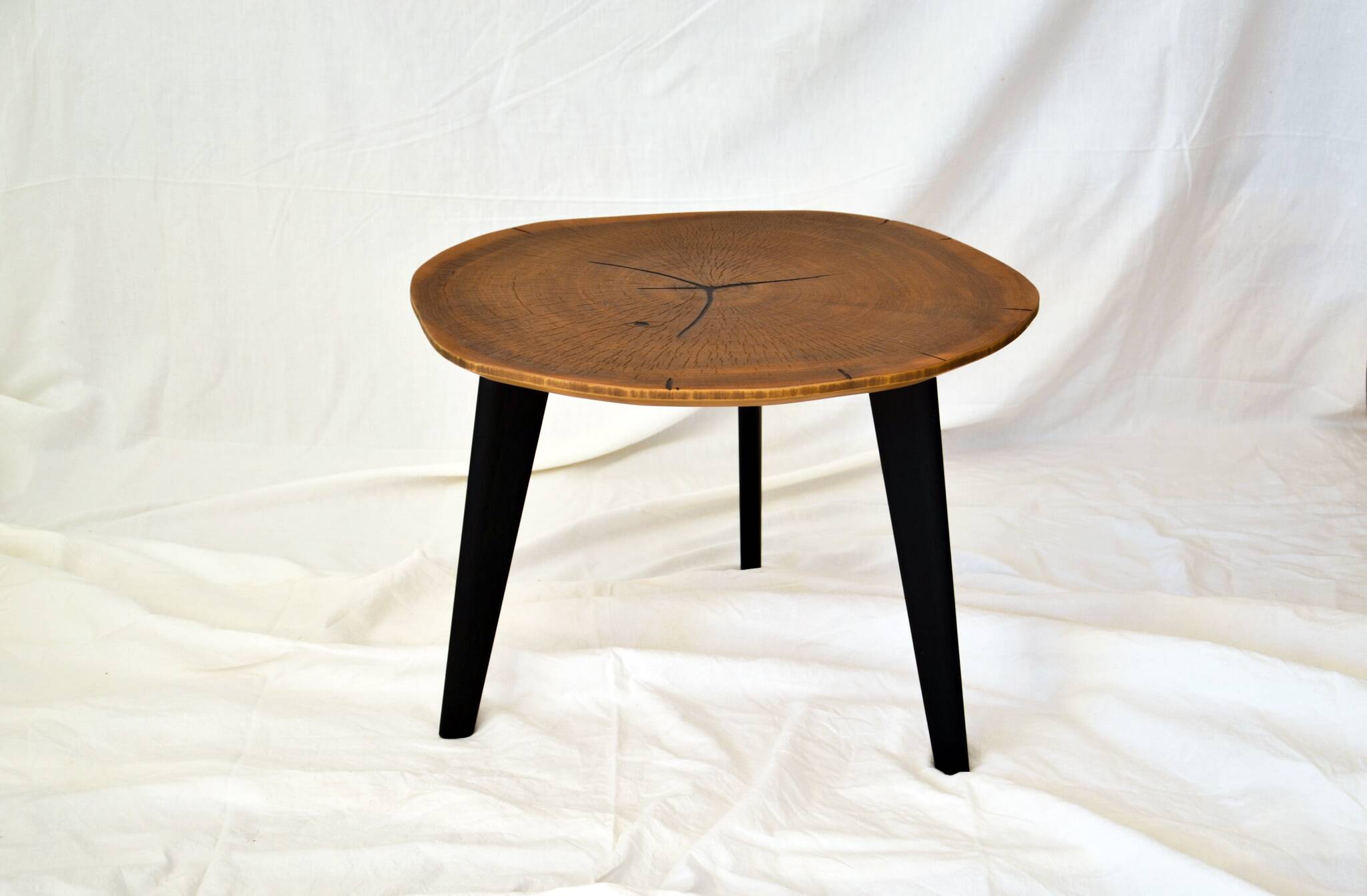 Round wooden coffee table walnut trunk