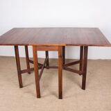 Table pliable danoise extensible en palissandre, avec 2 rallonges rabattables 1960