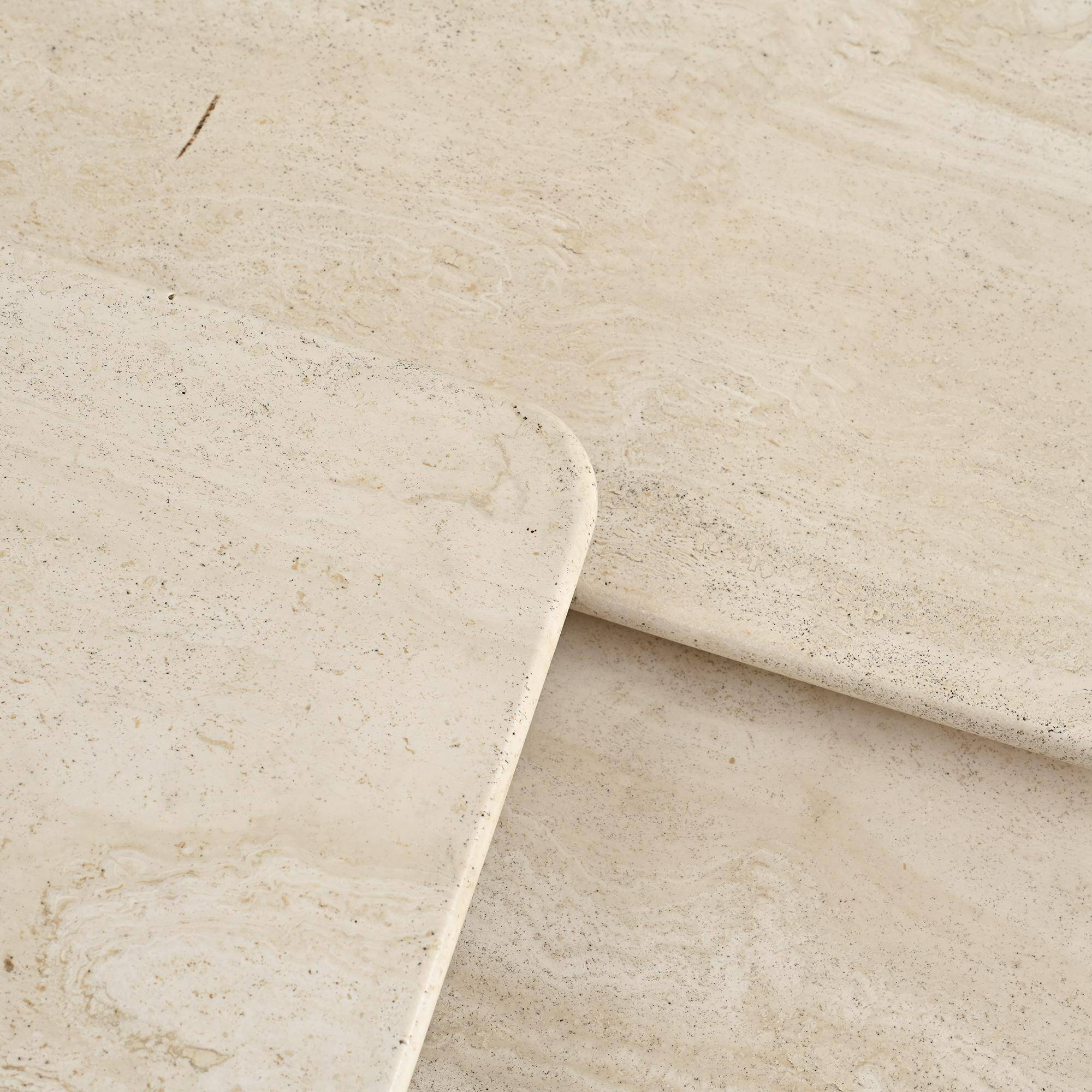 Set of three nesting tables in travertine, Italy circa 1970.