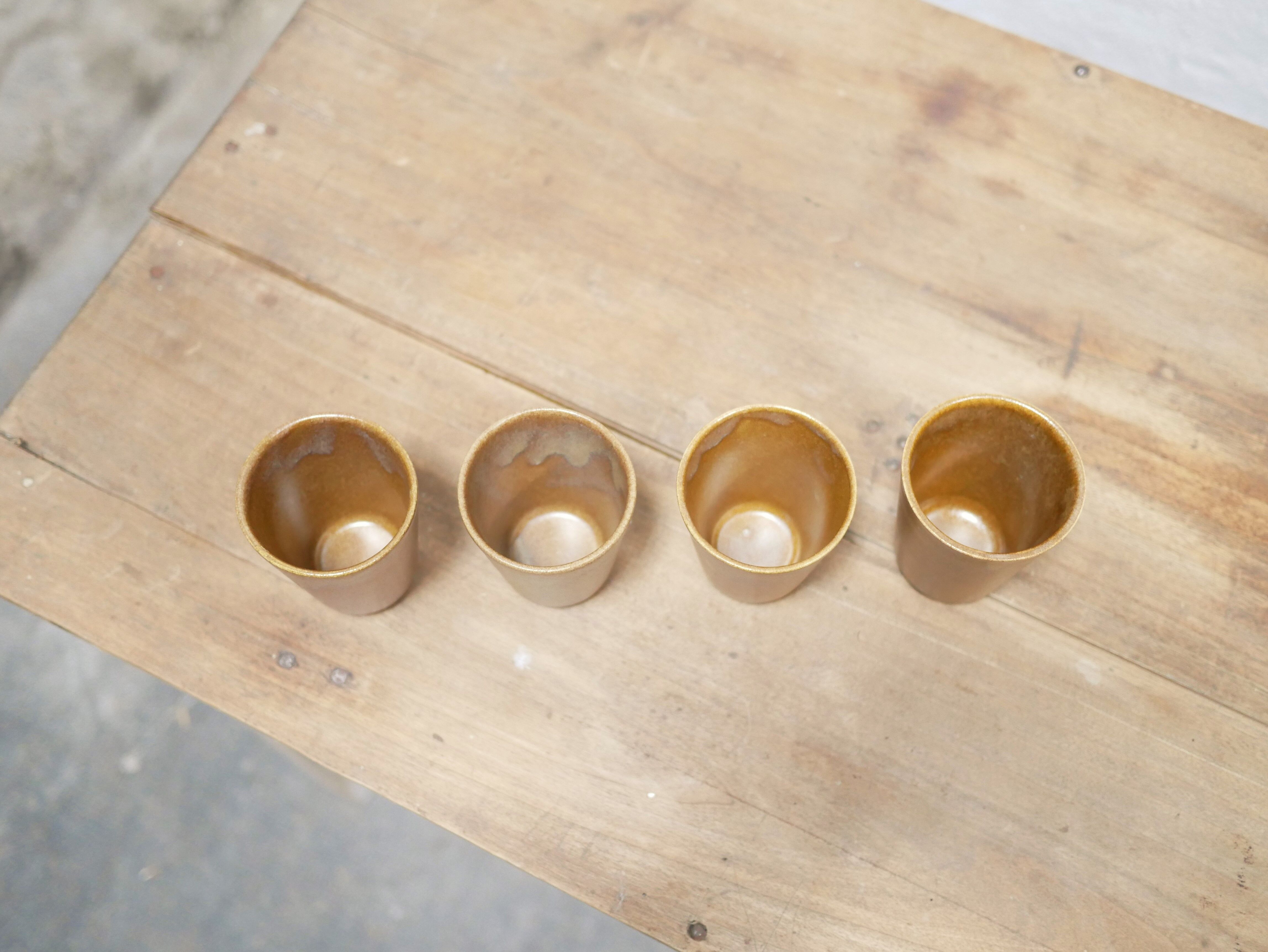 Series of 4 vintage stoneware glasses by the manufacture of Digoin, France