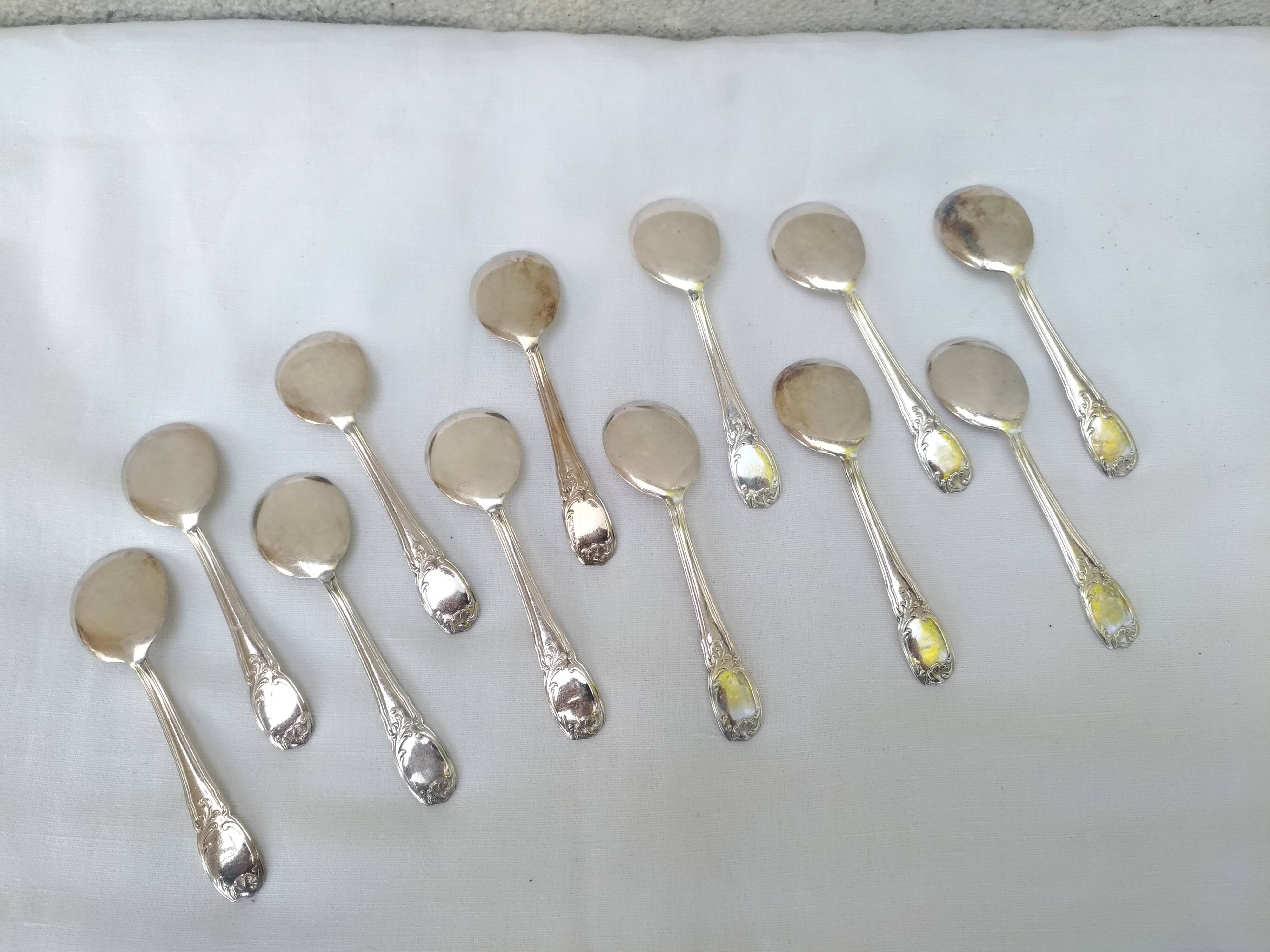 12 spoons of silver metal