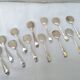 12 spoons of silver metal