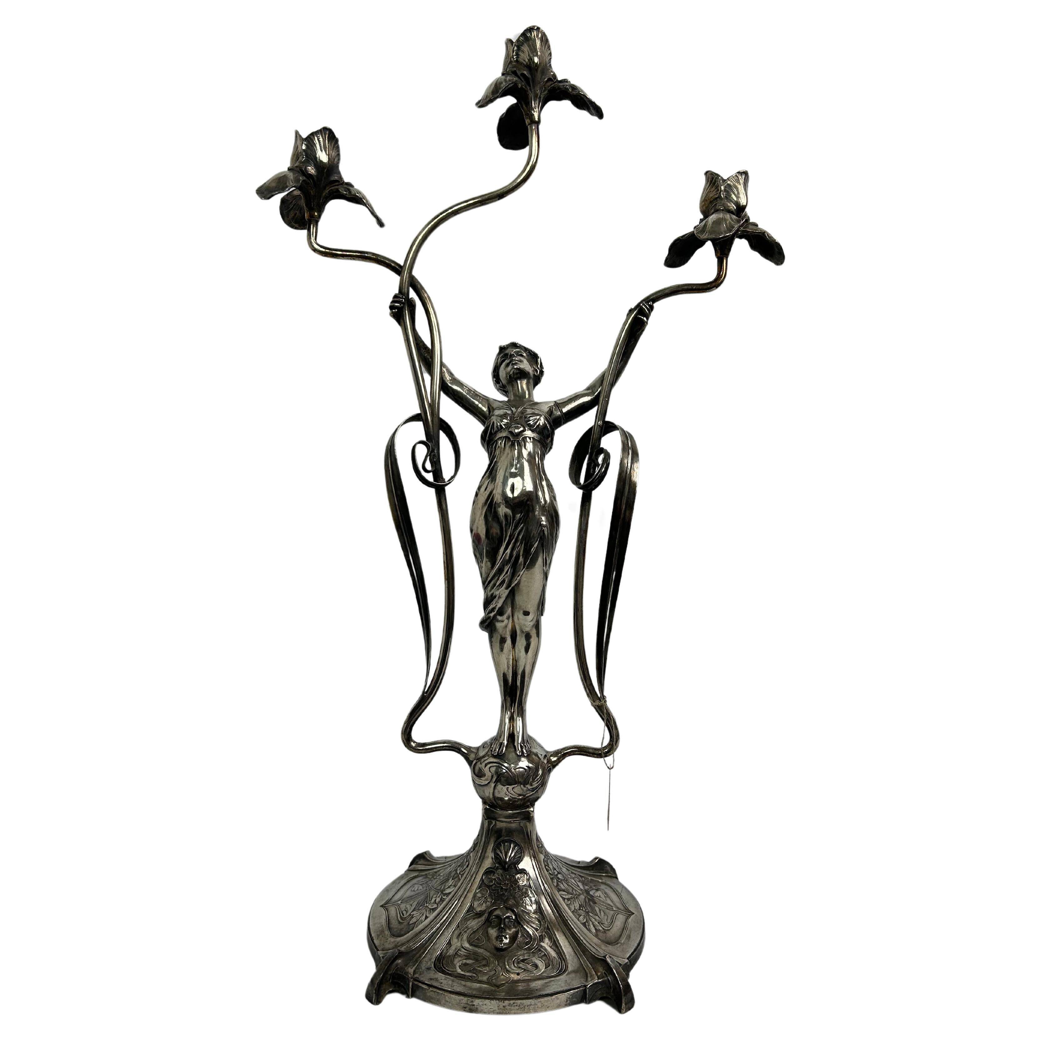 Large figurative chandelier with a femme fatale nymph.