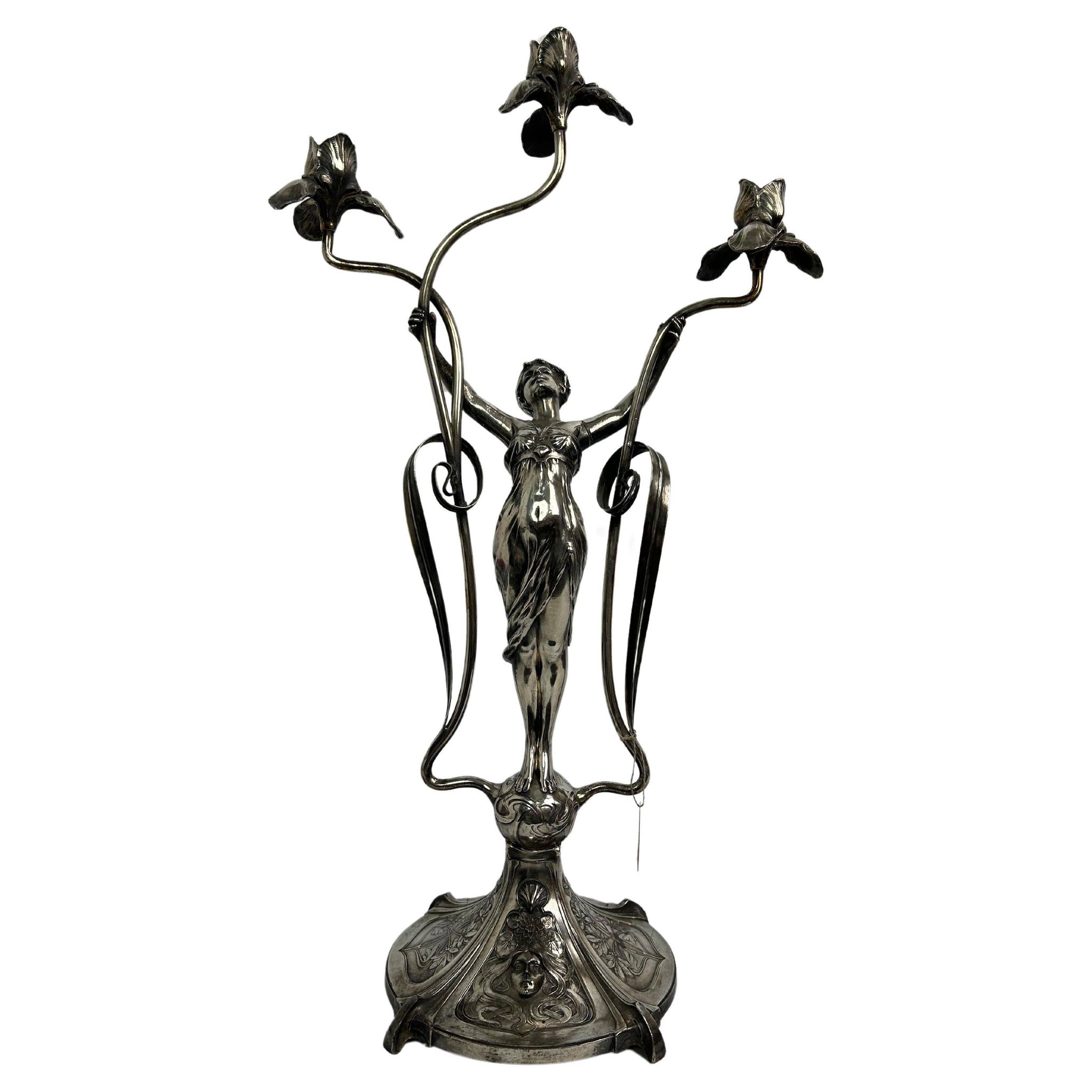 Large figurative chandelier with a femme fatale nymph.