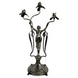 Large figurative chandelier with a femme fatale nymph.