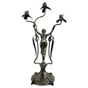 Large figurative chandelier with a femme fatale nymph.